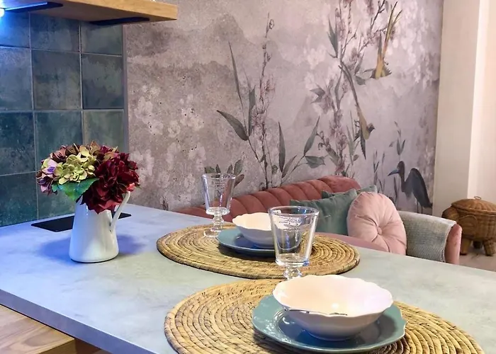 Aureliano San Román *