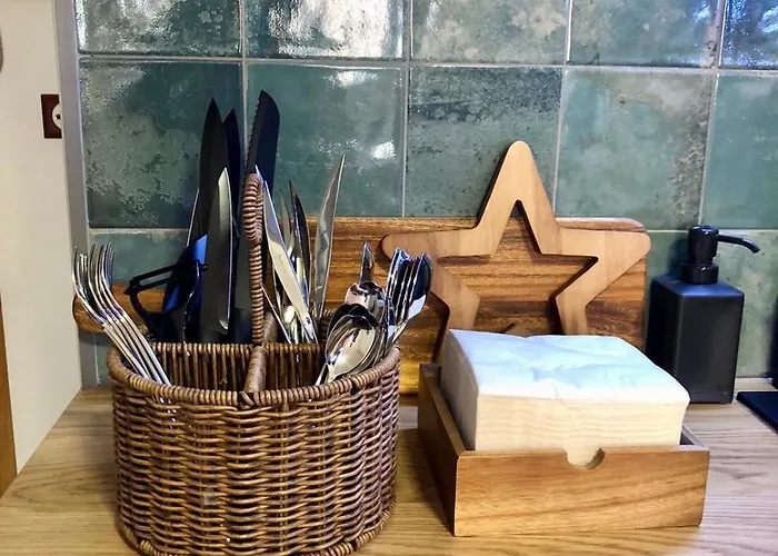 Aureliano San Román *